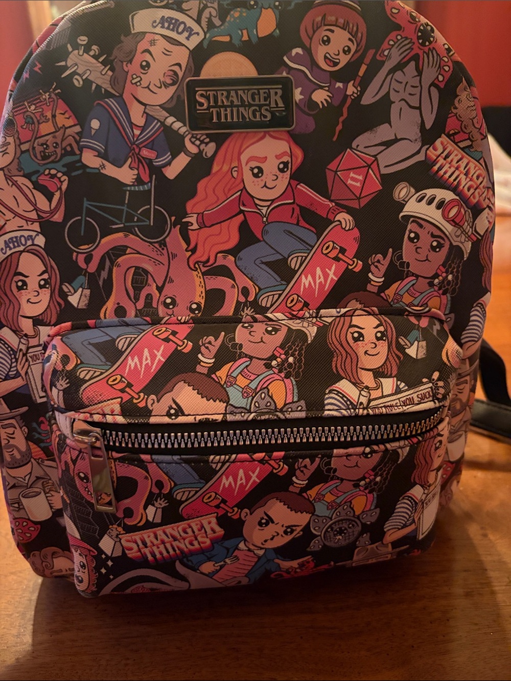 Bioworld Stranger Things Graphic Backpack — Black with Multicolor Characters